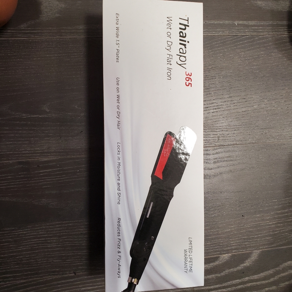 Thairapy wet and dry hair iron straightener